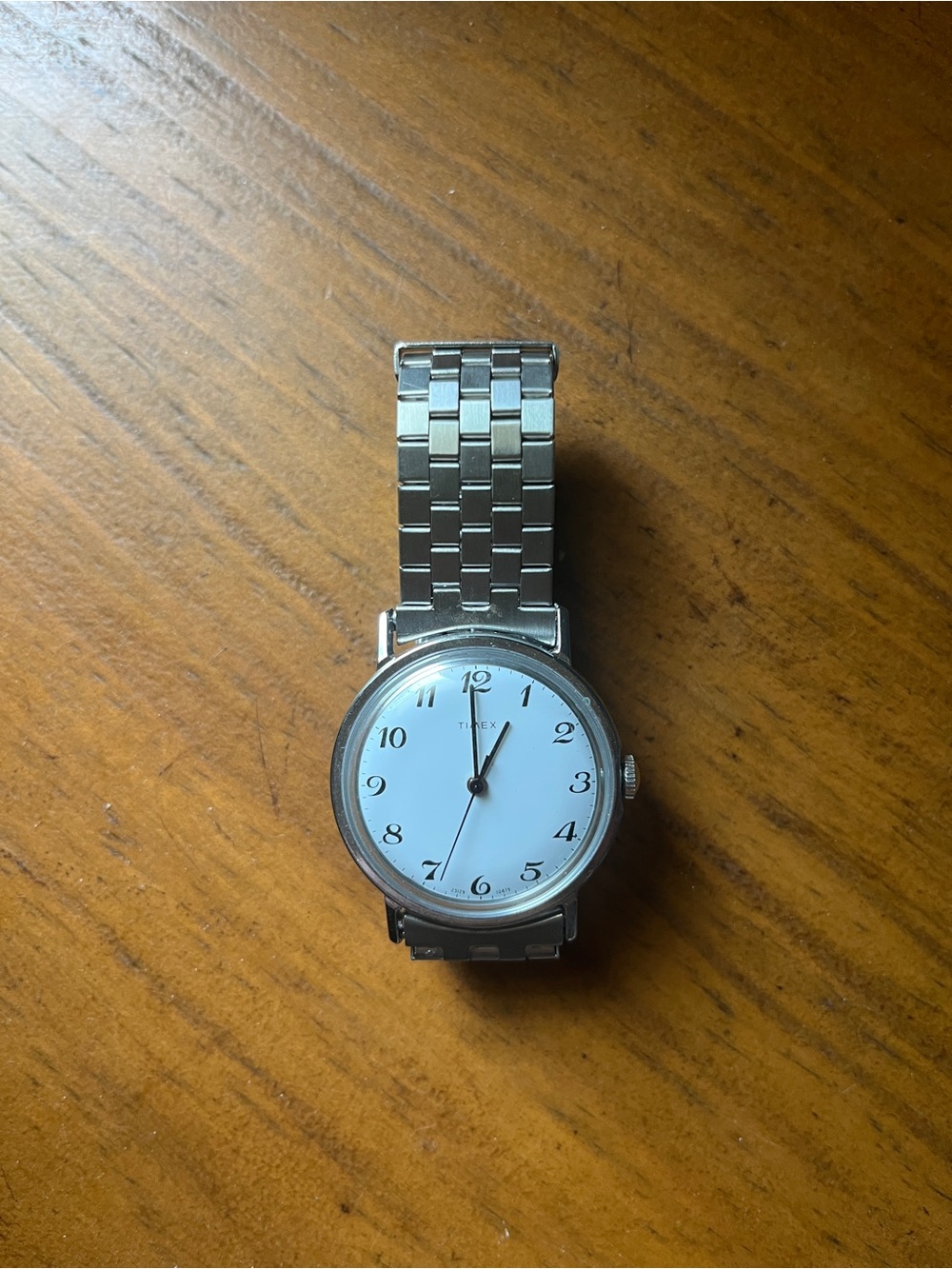 Timex Silver Watch with White Dial and Black Hands